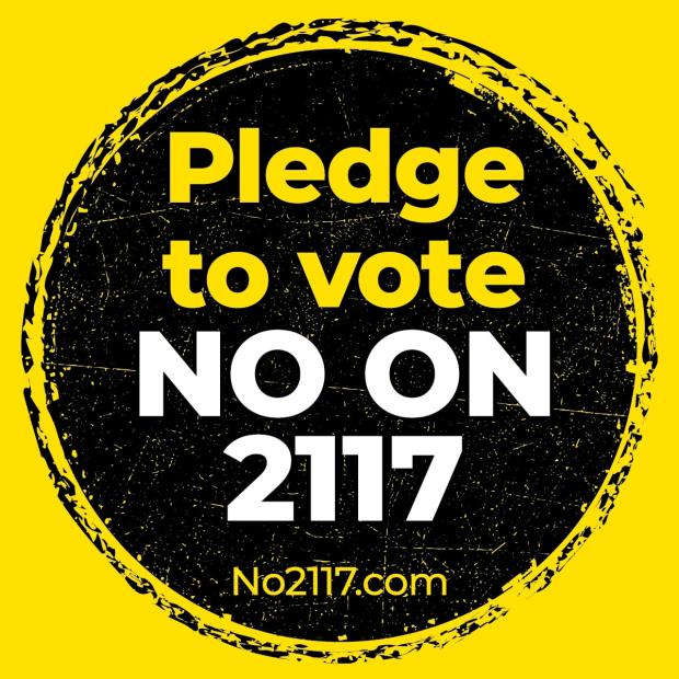 no on 2117 campaign logo, white text inside black circle on gold background