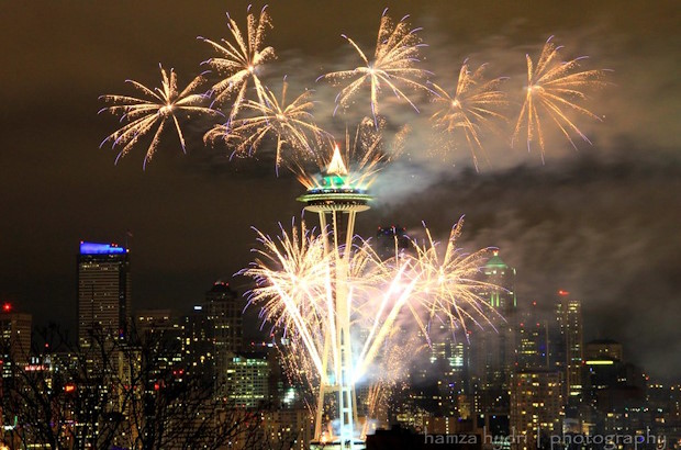 Photo of fireworks display and Seattle skyline
