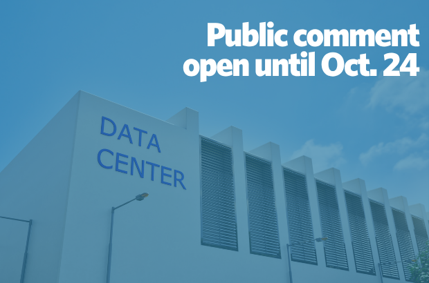 A data center with text that says "Public comment open until Oct. 24"