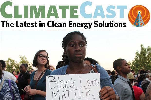 woman holding black lives matter sign in a crowd 