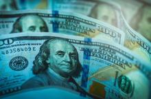 photo of a stack of hundred dollar bills