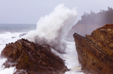 Image of wave crashing in the Oregon Coast