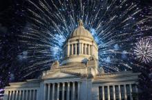 washington state capitol building with fireworks background
