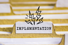 A file folder labeled "Implementation."