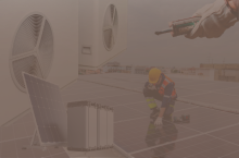 A clean energy worker surrounded by solar, battery storage, insulation, and heat pumps.