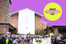 Make Polluters Pay advocates pose near the capital in Salem