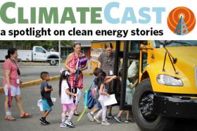 Photo of kindergarteners boarding an electric school bus